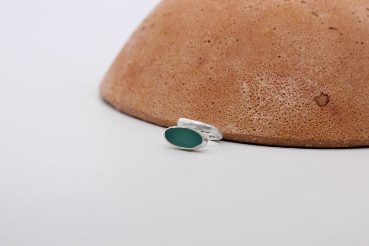 Teal oval shape ring