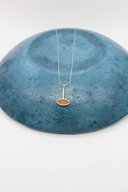 Yellow ochre oval shape pendant