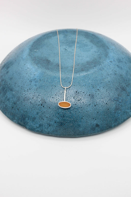 Yellow ochre oval shape pendant