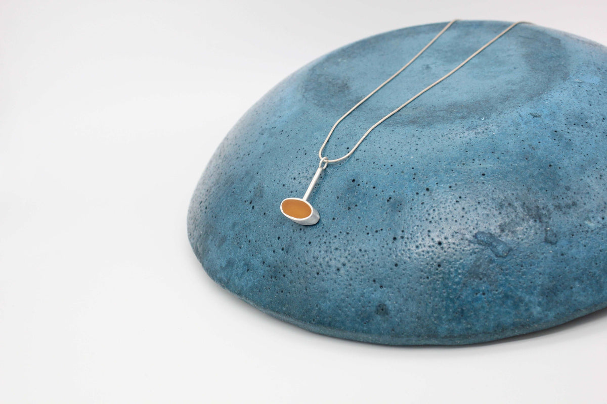 Yellow ochre oval shape pendant