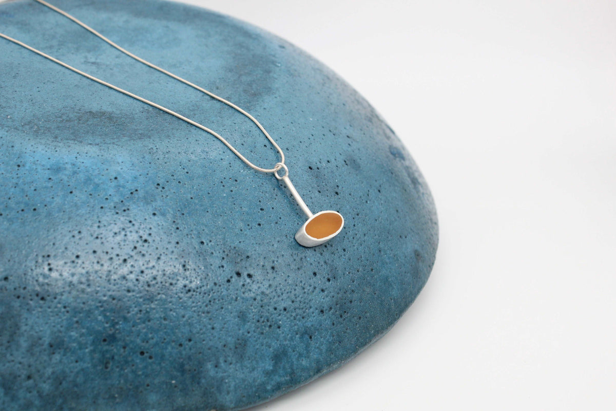 Yellow ochre oval shape pendant