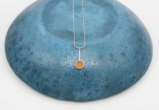 Yellow ochre round shape pendant