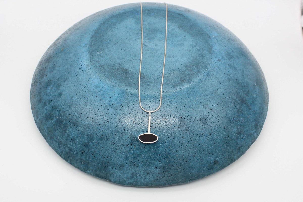 Black oval shape pendant