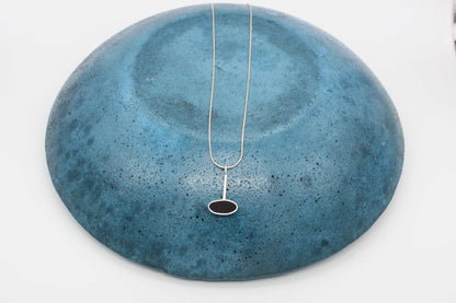 Black oval shape pendant