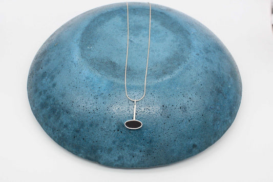 Black oval shape pendant