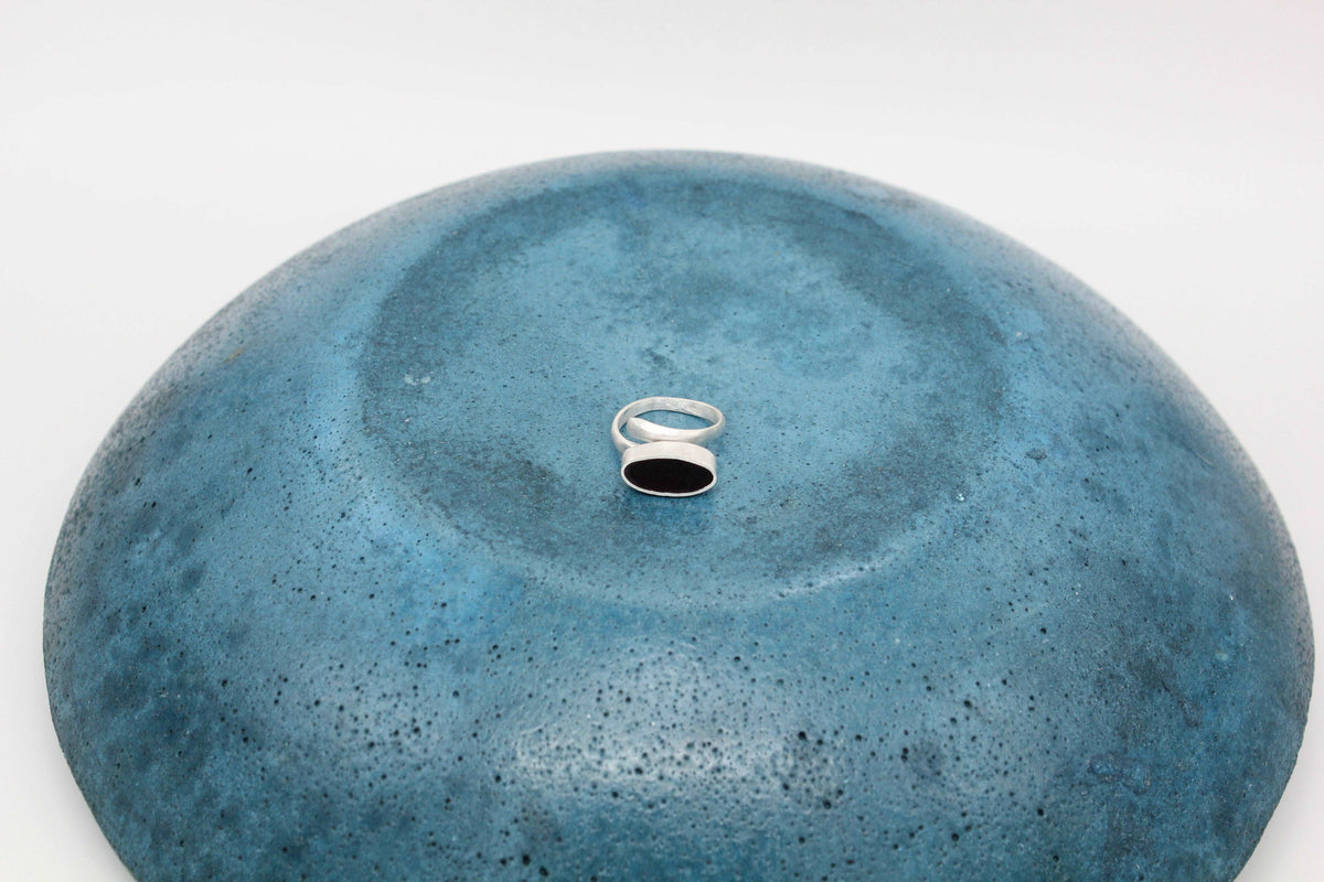 Black oval shape ring