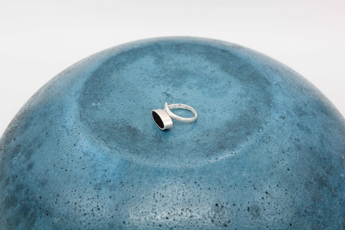 Black oval shape ring