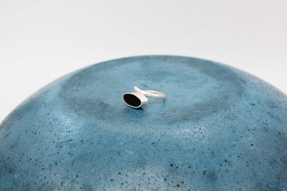 Black oval shape ring