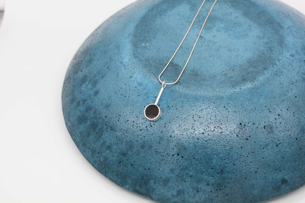Black round shape pendant